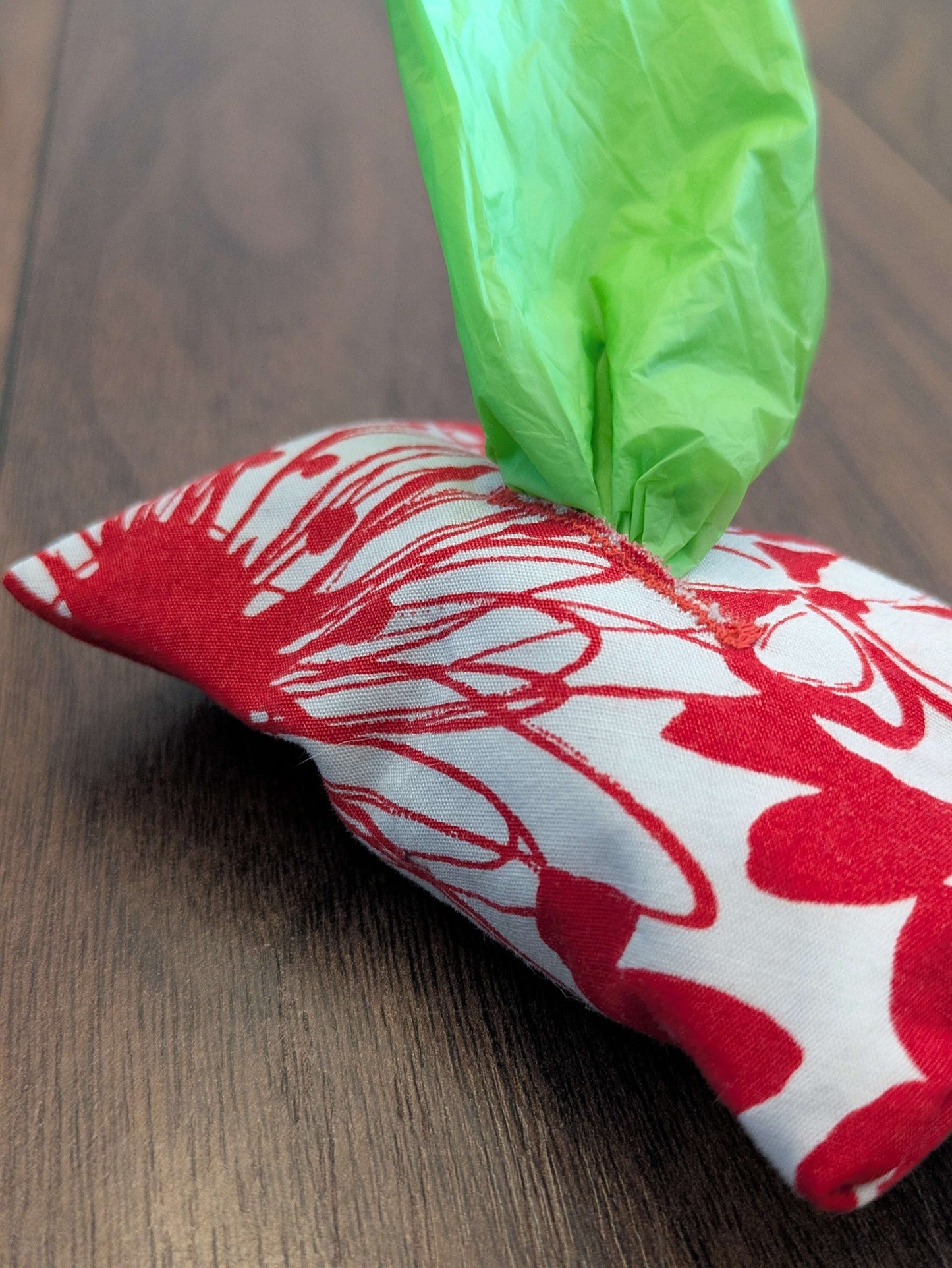 Red floral poo bag holder