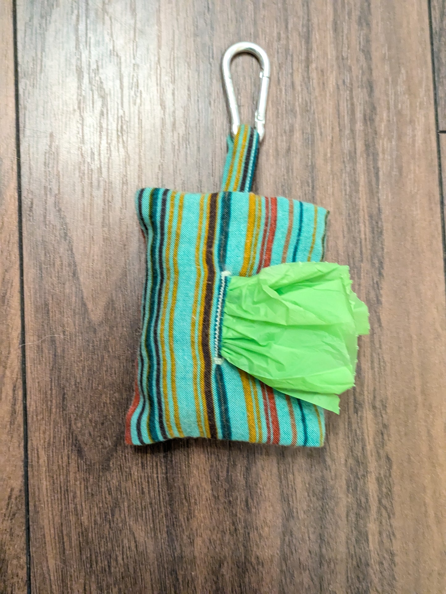 Turquoise spice poo bag holder