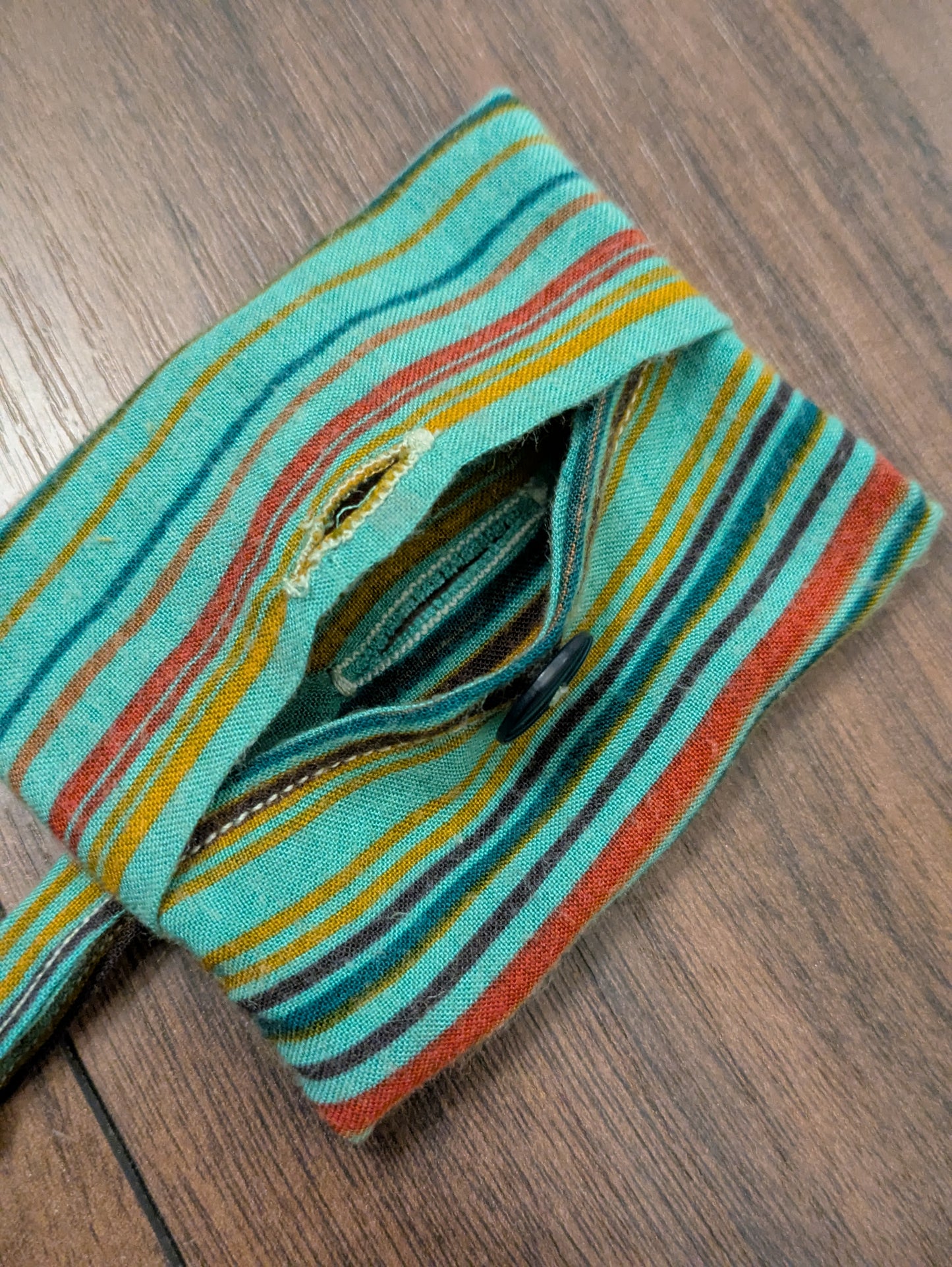 Turquoise spice poo bag holder