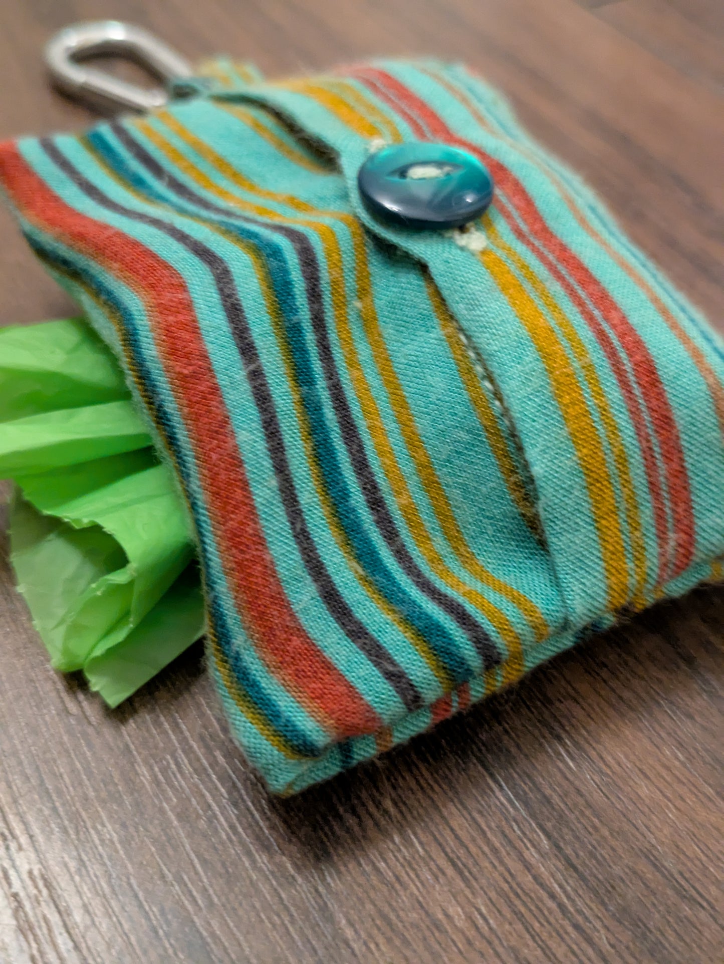 Turquoise spice poo bag holder