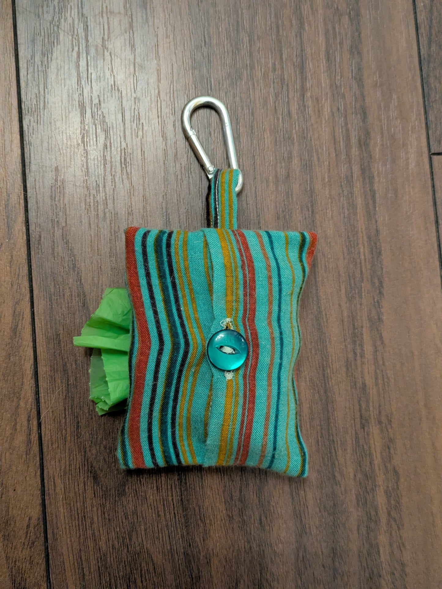 Turquoise spice poo bag holder