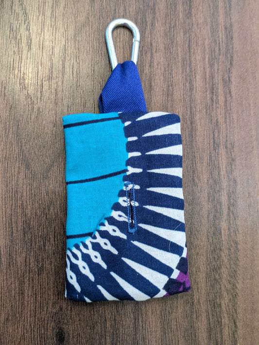 Upcycled Refillable Dog Poo Bag Holder – Clip-on Dispenser, Eco-Friendly & Handmade in the UK from recycled fabric. A dog walking essential in blue and purple african print complete with button hole and metal clip.